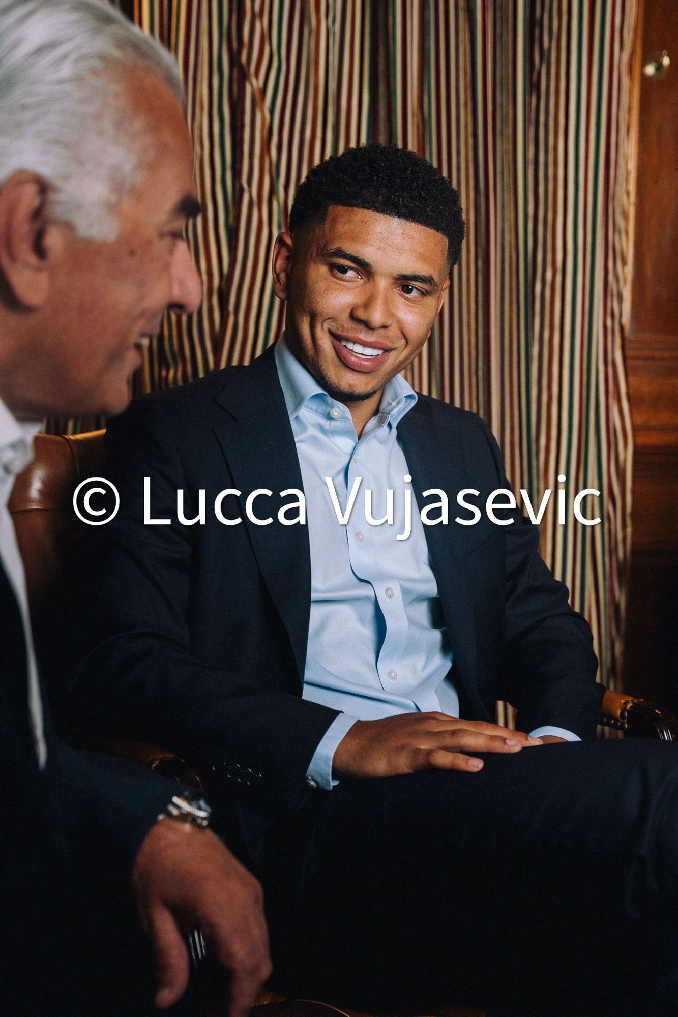 An Artane Partners advisor in conversation with a client